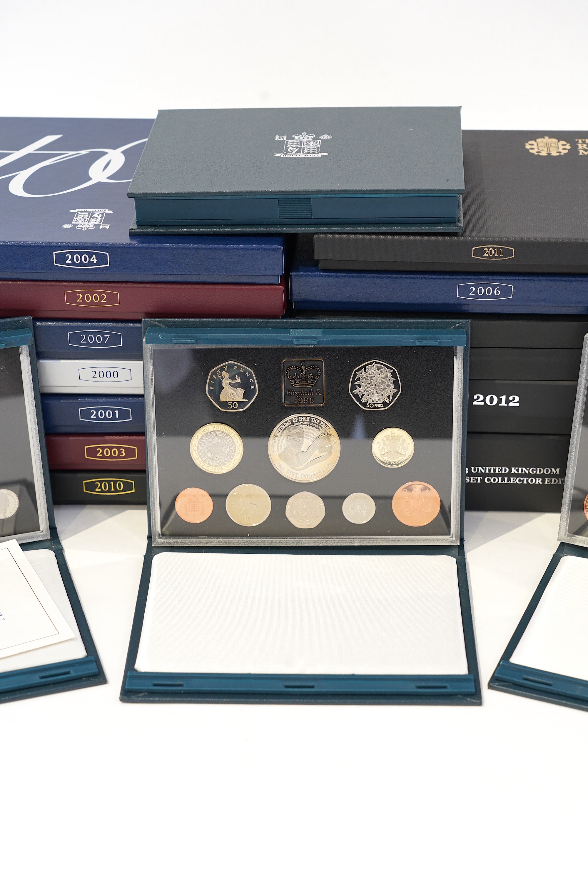 British proof coin year sets, Elizabeth II, sixteen cased sets covering the years 1996-2004, 2006-2008 and 2010-2013, each in case of issue with certificate